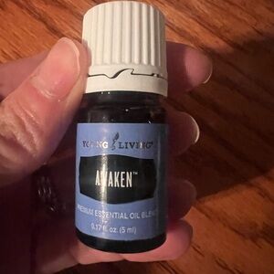 Young Living Awaken Oil in Blue and White
